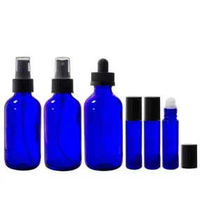 4 oz Cobalt Blue Glass Bottle 6 pc Starter Kit: Includes 3-10ml Roll On, 1-4 oz Boston Round Spray Mister, 1-4 oz Boston Round Treatment Pump, 1-4 oz Boston Round Dropper Bottle   Clear Travel Bag