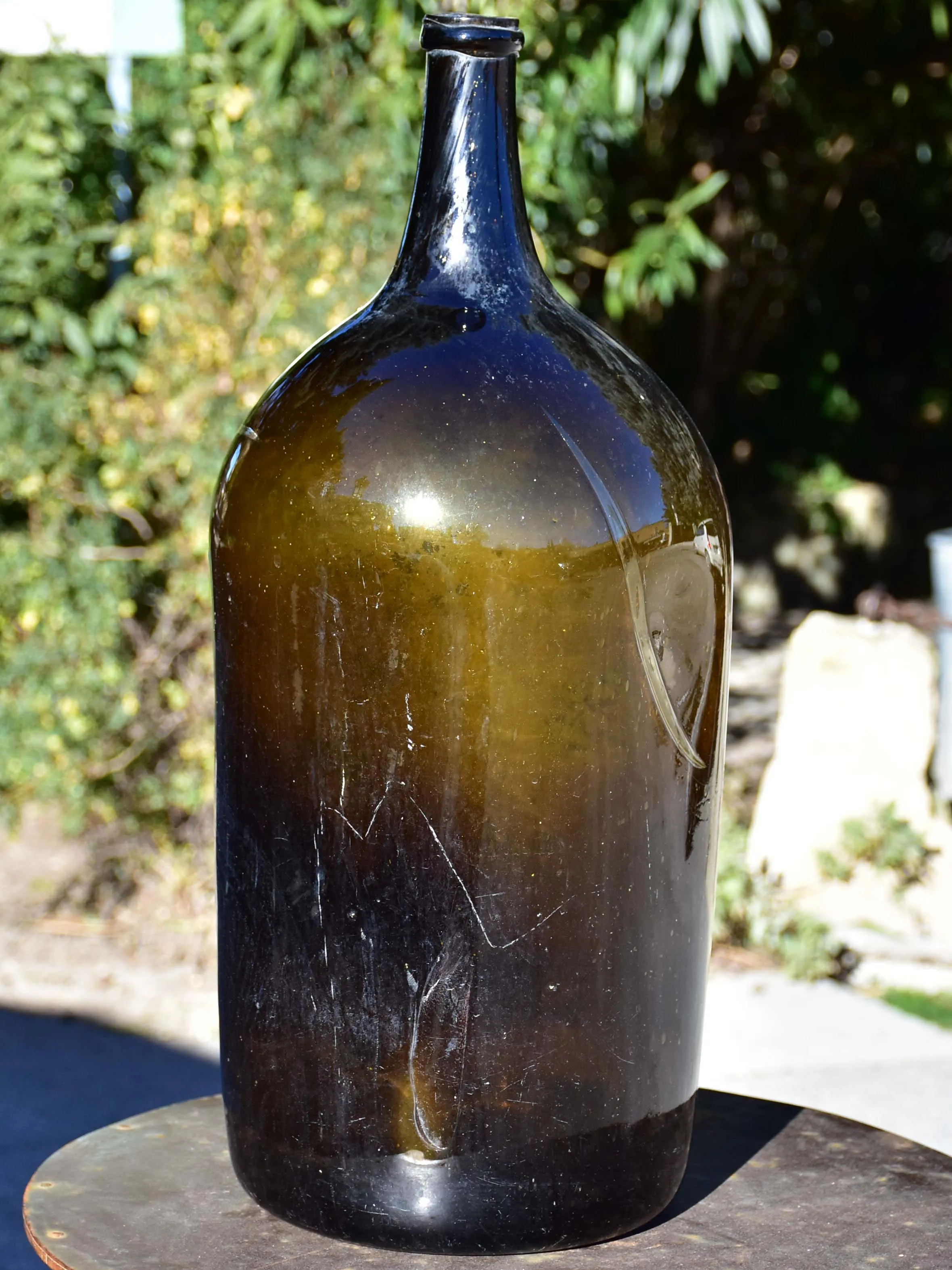 Large antique French wine bottle from Trinquetaille